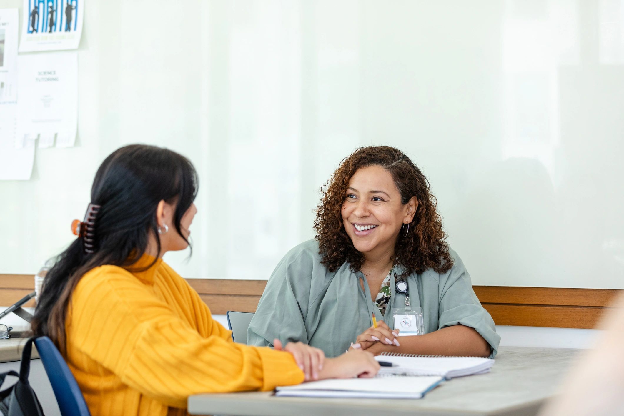 Advisor meeting with a student in a consultation setting